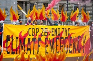 Protest at COP26….Will world leaders find a balance between human health and planetary health Credit to Alamy