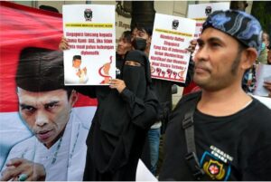 Supporters of Indonesian preacher Abdul Somad Batubara